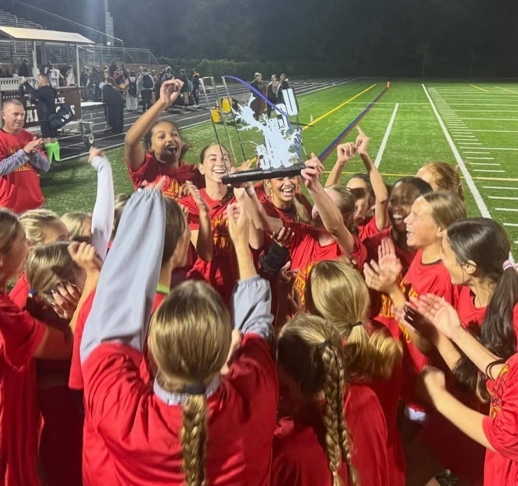 Teammates are cheering.