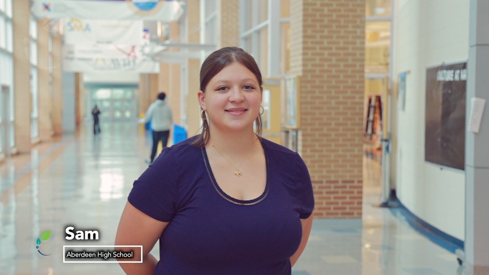 Student Sam standing in the Aberdeen High School hallway