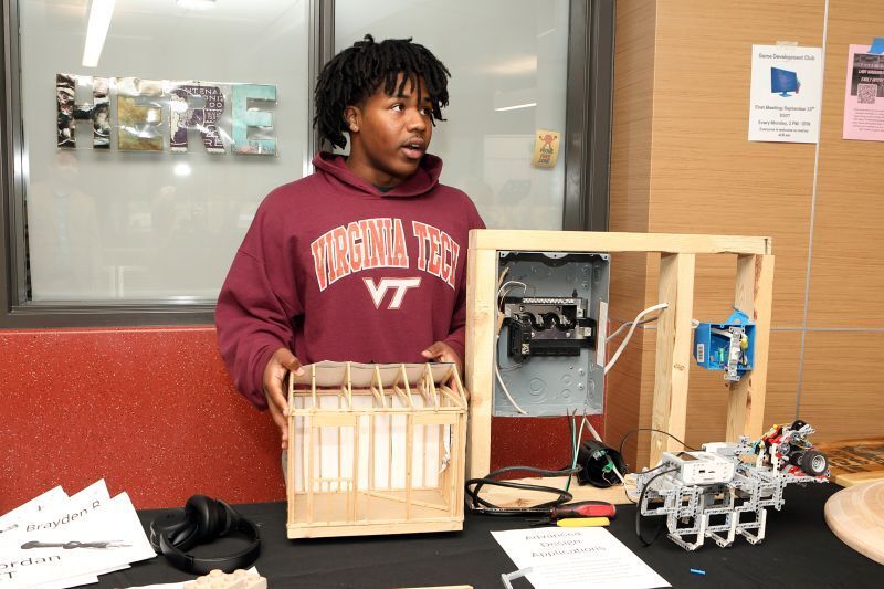Student presenting knowledge in showcase