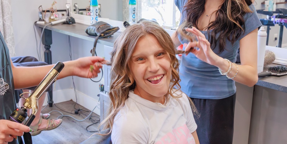 Harford Academy Student having her hair curled