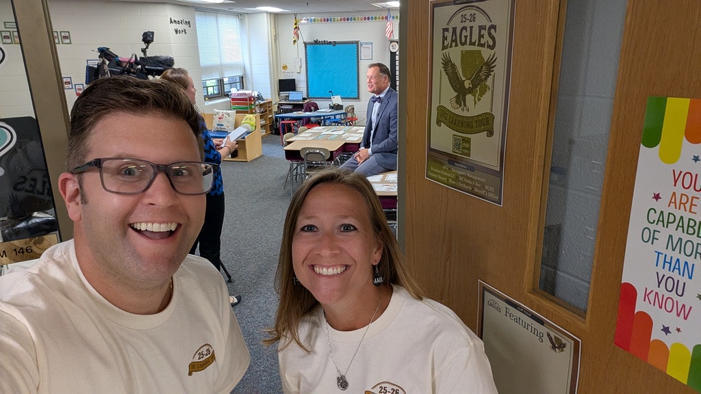 Mr. Greenbaum and Ms. Ondish photobombing Dr. Bulson and WBALtv