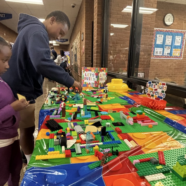 student building legos