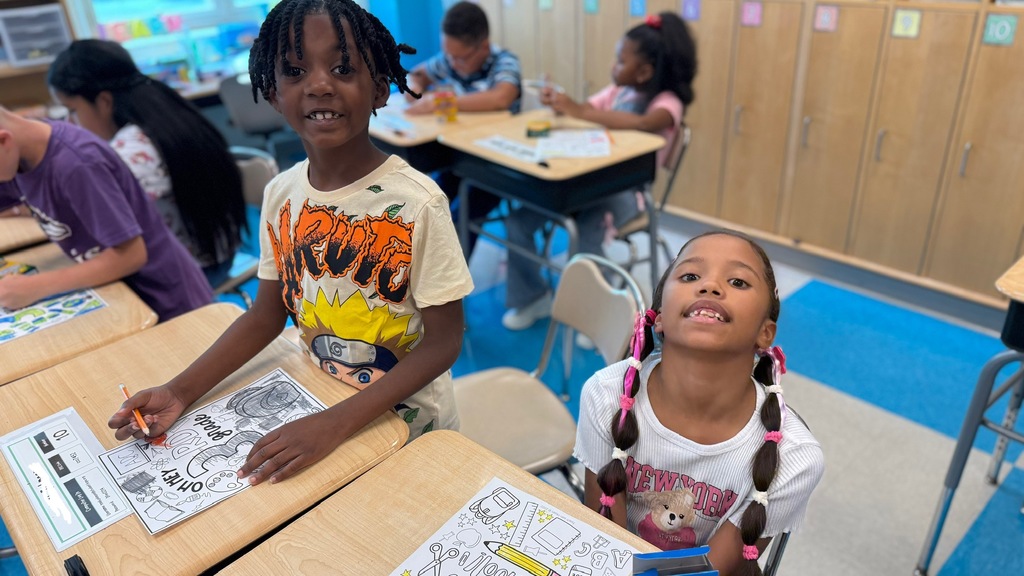 Smiling students on the first day of school.