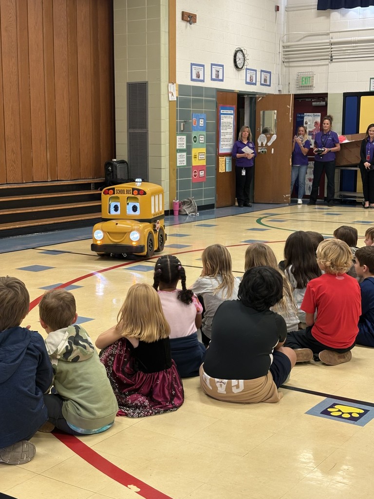 Students learning with Buster