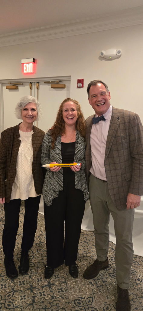 Mrs. Criswell receiving her recognition