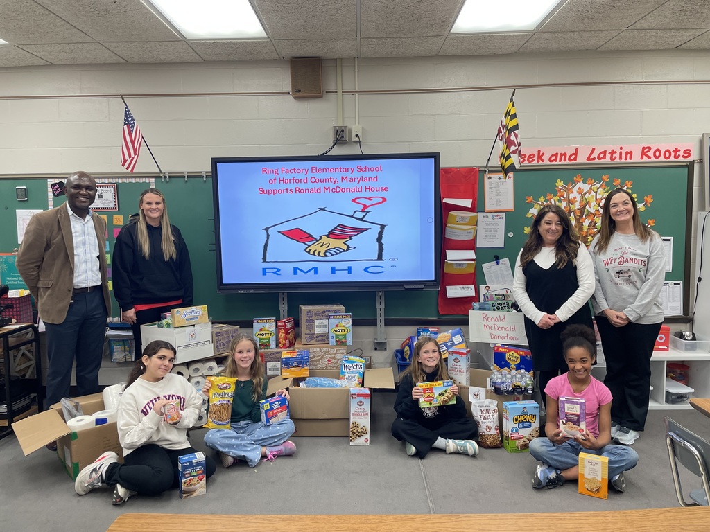 Ring Factory Elementary Students and Staff pose with donations for the Ronald McDonald House