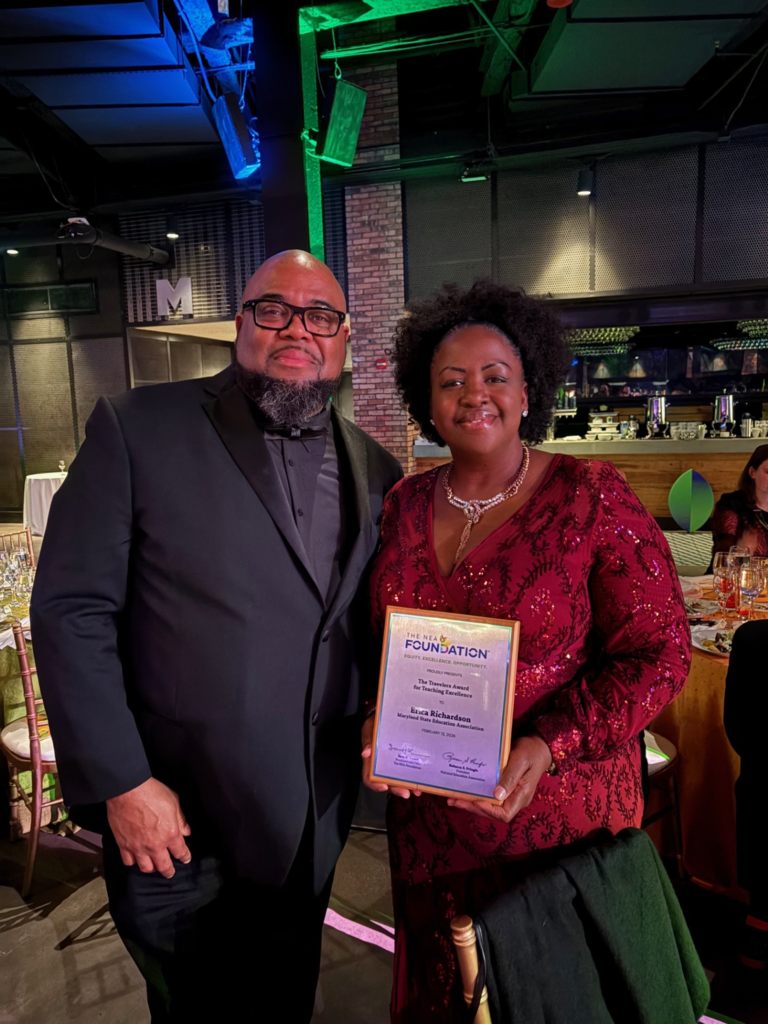 Erica Richardson, HCPS 2024 Teacher of the Year, poses with her NEA Foundation Travelers Award for Teaching Excellence certificate at the Salute to Excellence in Education Gala on February 13, 2026 in Washington, D.C.
