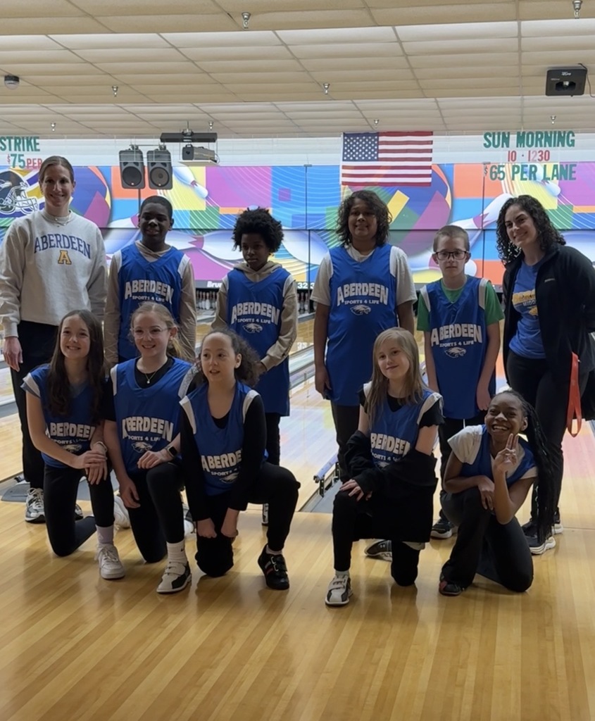 Students are wearing  blue Aberdeen Middle Sports for Life Jerseys at the bowling alley.