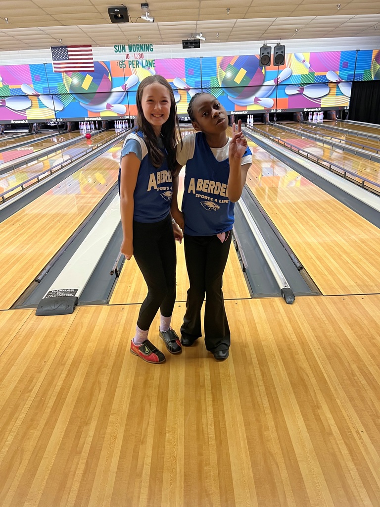 Two students posing for picture