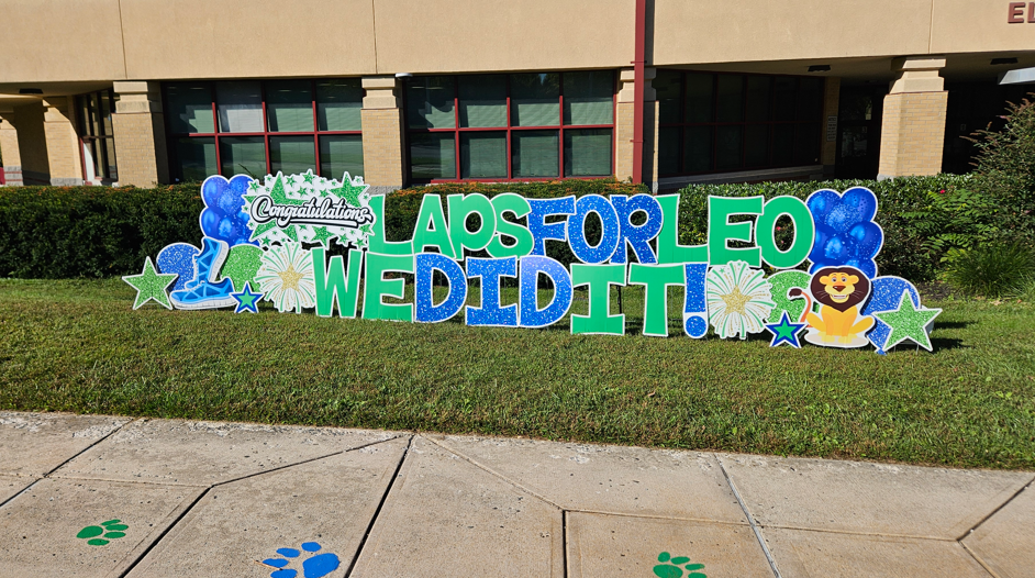 green and blue letters saying Laps for Leo