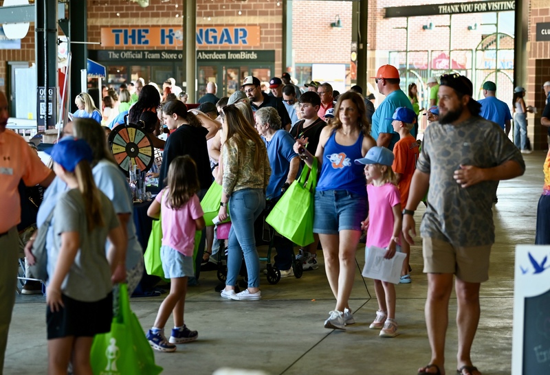 crowd walks through the concourse at Ripken Stadium