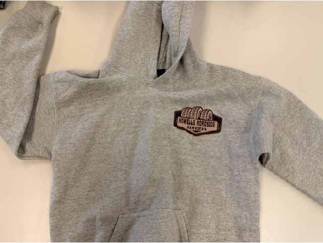 Gray sweatshirt with Howells Roadside Services logo on it