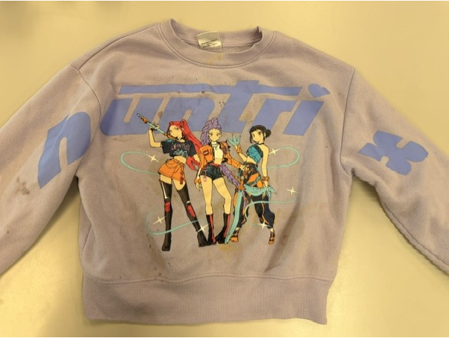 light purple sweatshirt with graphic on it