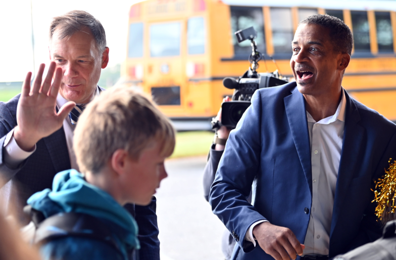 Dr. Bulson and Dr. Davis welcome students at North Harford Middle School