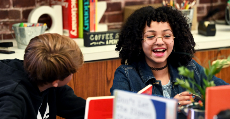 Students interacting in class
