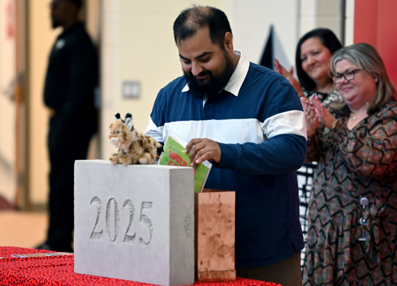 Homestead-Wakefield parent adds a yearbook to the capstone