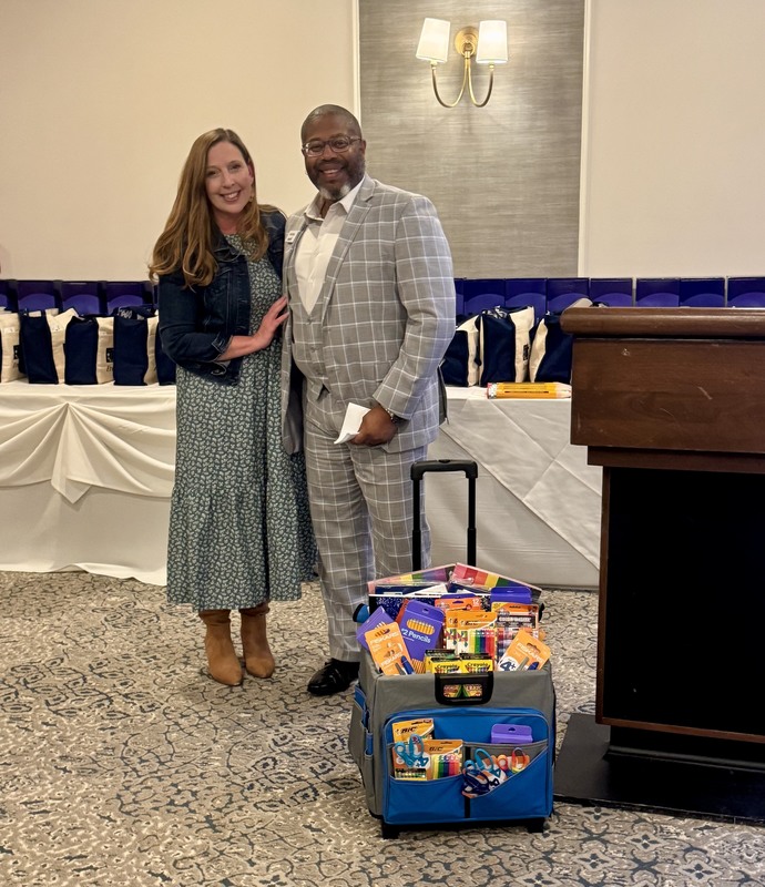 Teacher accepting School Supplies