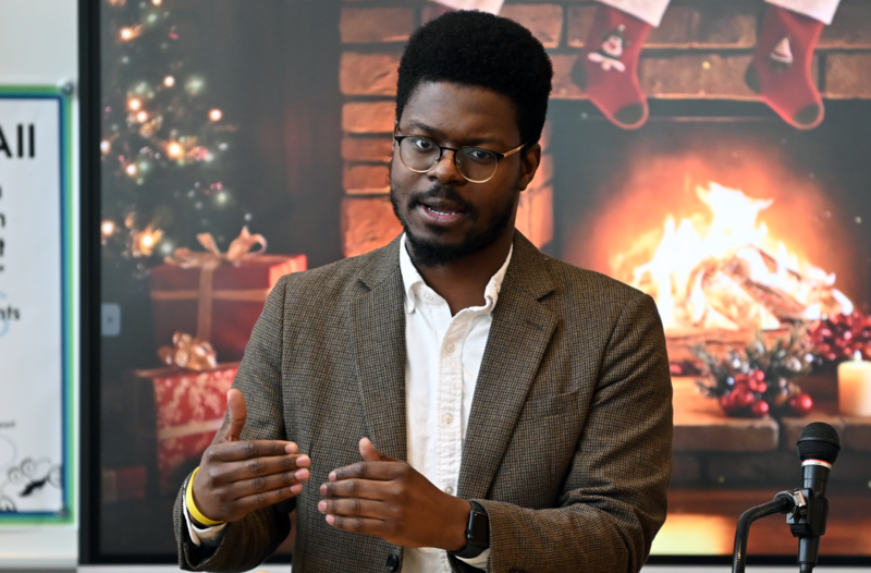 Former page, and 2012 graduate of Aberdeen High School, Belawoe Akwakoku, addresses the Pages