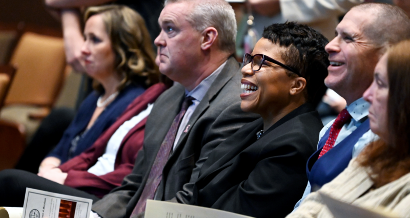 Dr. Mack and members of executive leadership listen and laugh during the question and asnwer session with Maryland Supreme Court Justices.