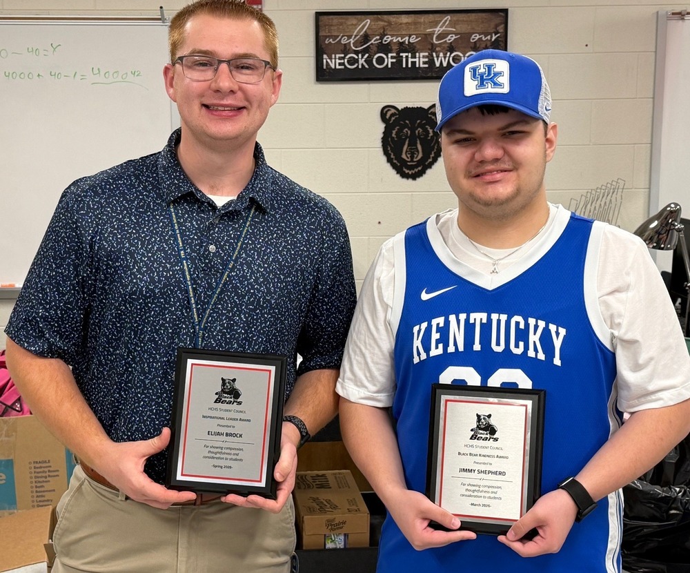 Elijah Brock and Jimmy Shepherd receive Black Bear Awards.
