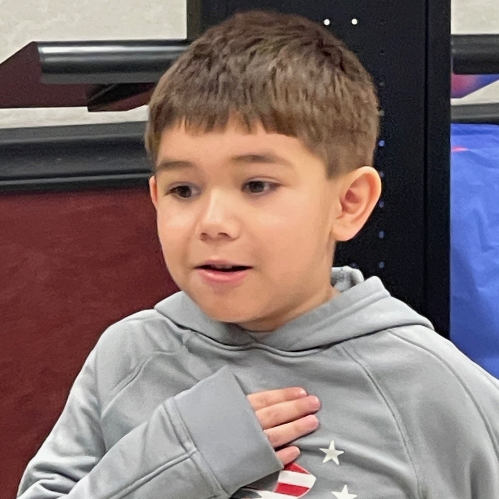 Cumberland Elementary Kindergarten Student Anthony Farley says the Pledge of Allegiance.