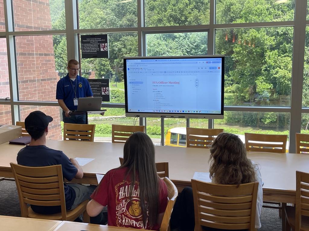 HCHS Agriculture Teacher Elijah Brock meets with FFA officers. 