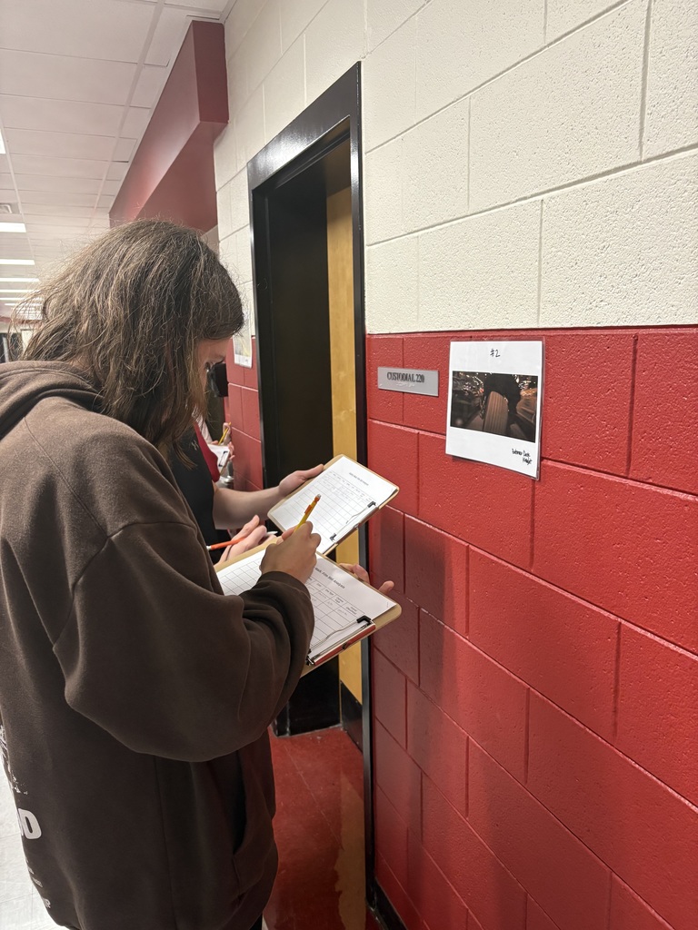 Mrs. Mitchell's Film Studies class participated in a Gallery Walk and analyzed various film stills using the components of mise-en-scéne: setting, costume, props, lighting, color, shot type, and camera angle. 