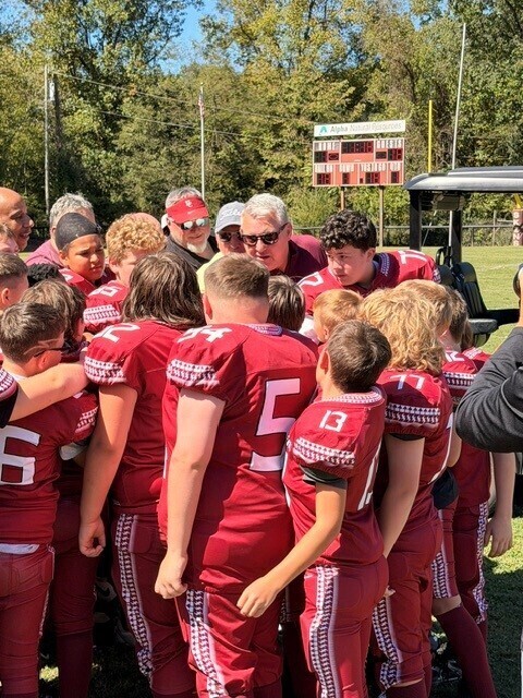 Maggard breaks a huddle with the Cumberland Middle School team.