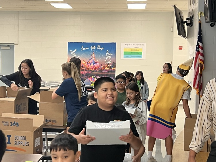 passing out supplies