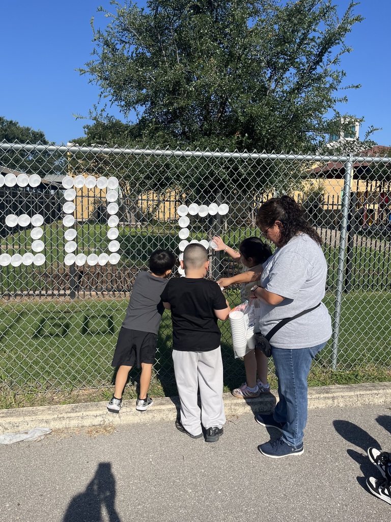 PREK STUDENTS MAKING SIGN
