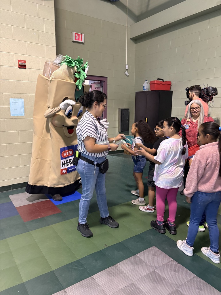 Students lined up to meet H-E-Buddy