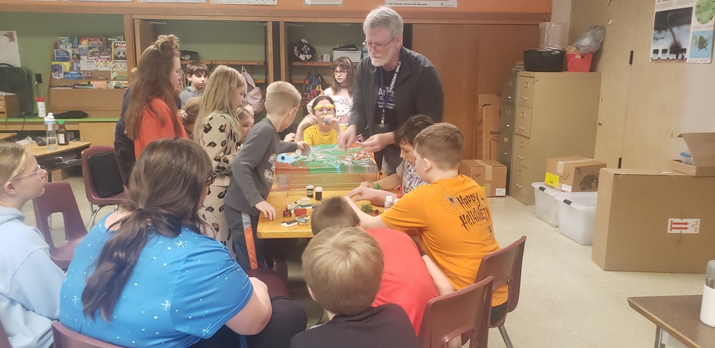 Mr. Faint helping the 5th grade science class.