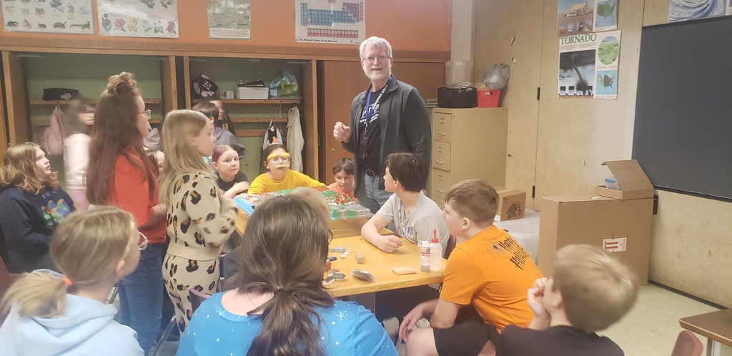 Mr. Faint and 5th grade working on a science demonstration.