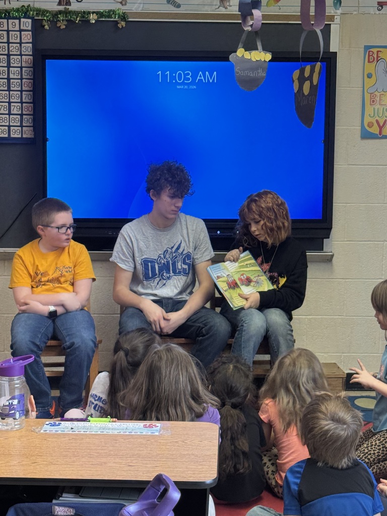 Group of 4H students helping to share Ag-Literature in Harmony Elementary