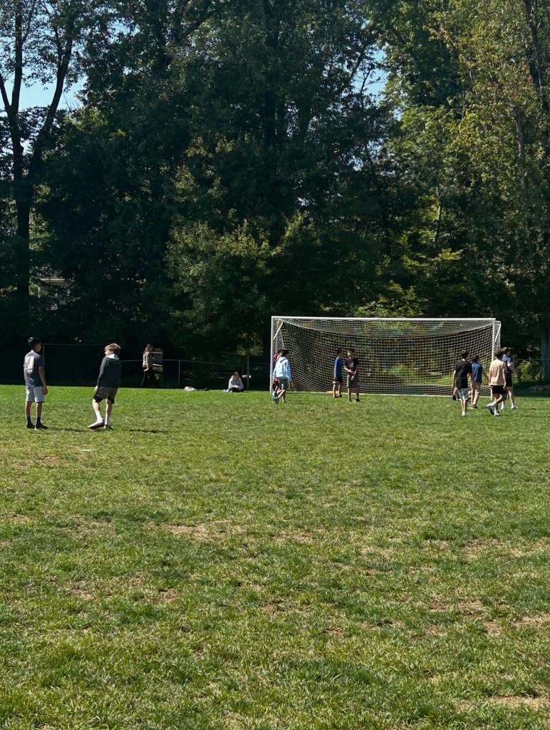 Students playing soccer