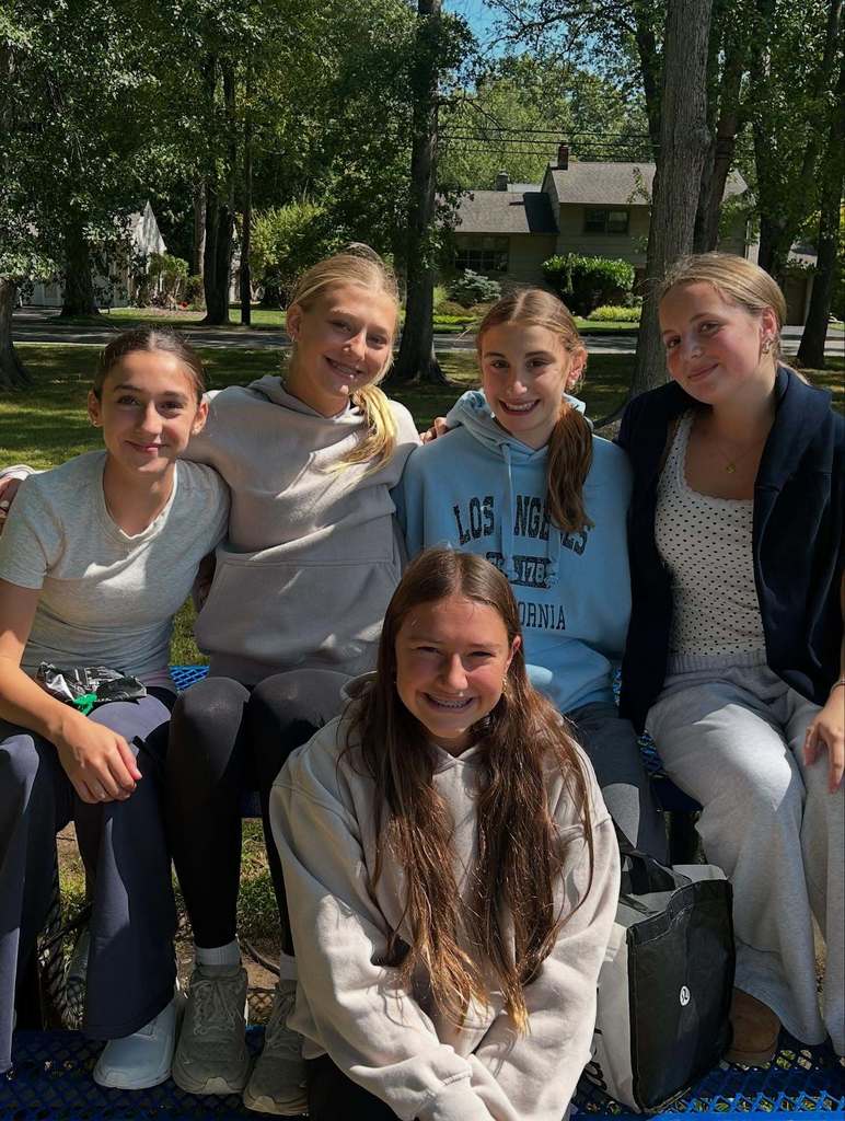 Students smiling outside