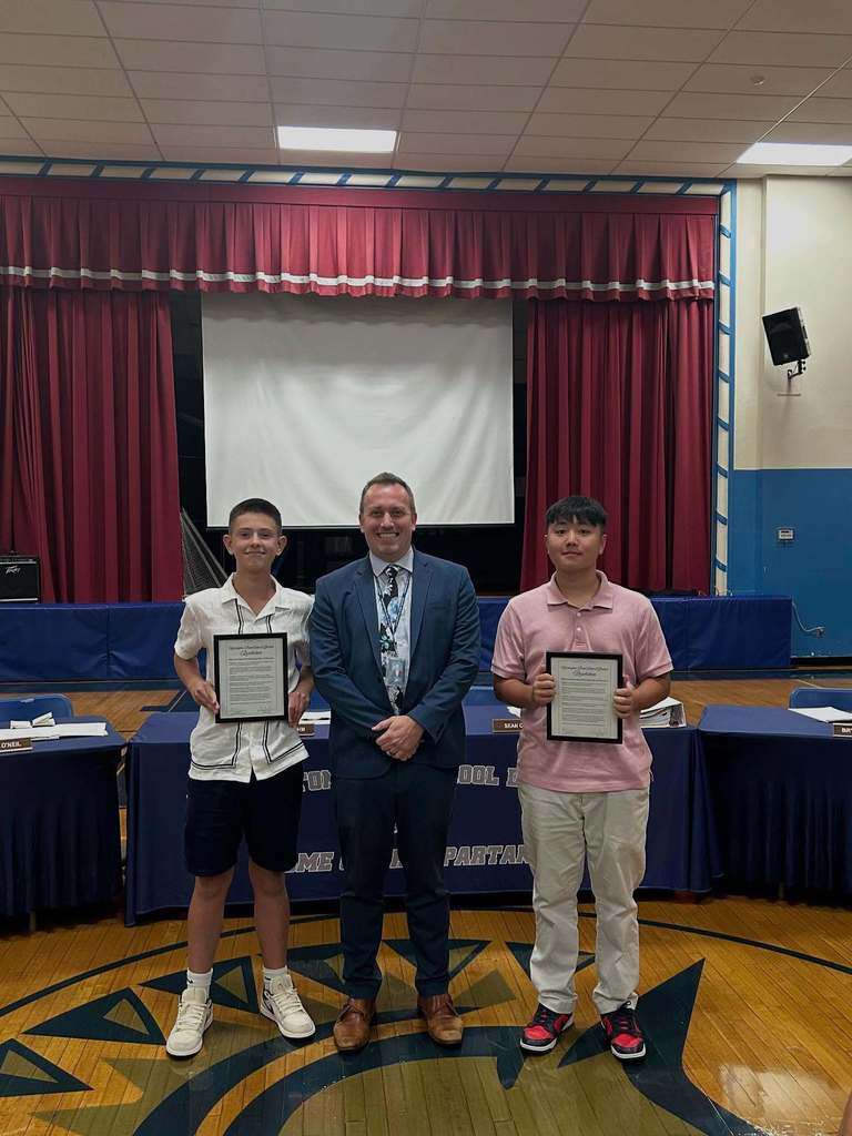 Mr. Conlon and the BOE honors students Blaise Chiang and Julian Torrie for their work organizing the Mary Strong Event.
