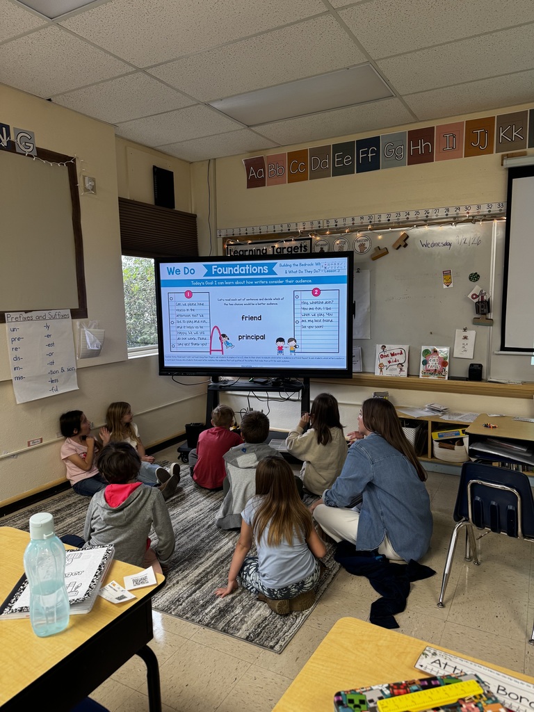children looking at smart tv 