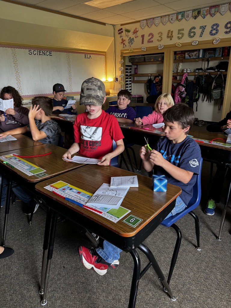 Children working at their school desks