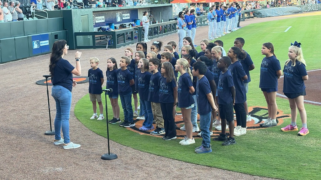 Music Makers singing the National Anthem