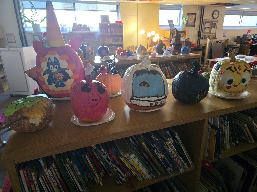 Storybook pumpkins and potatoes on display in the library