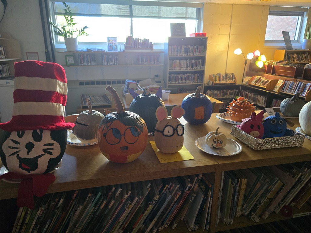 Storybook pumpkins and potatoes on display in the library