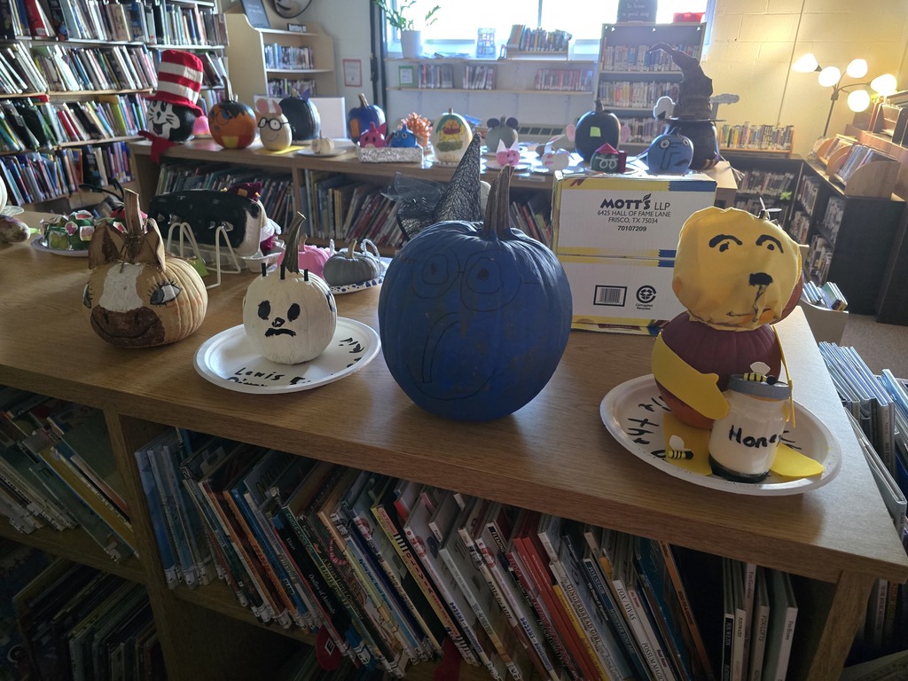 Storybook pumpkins and potatoes on display in the library