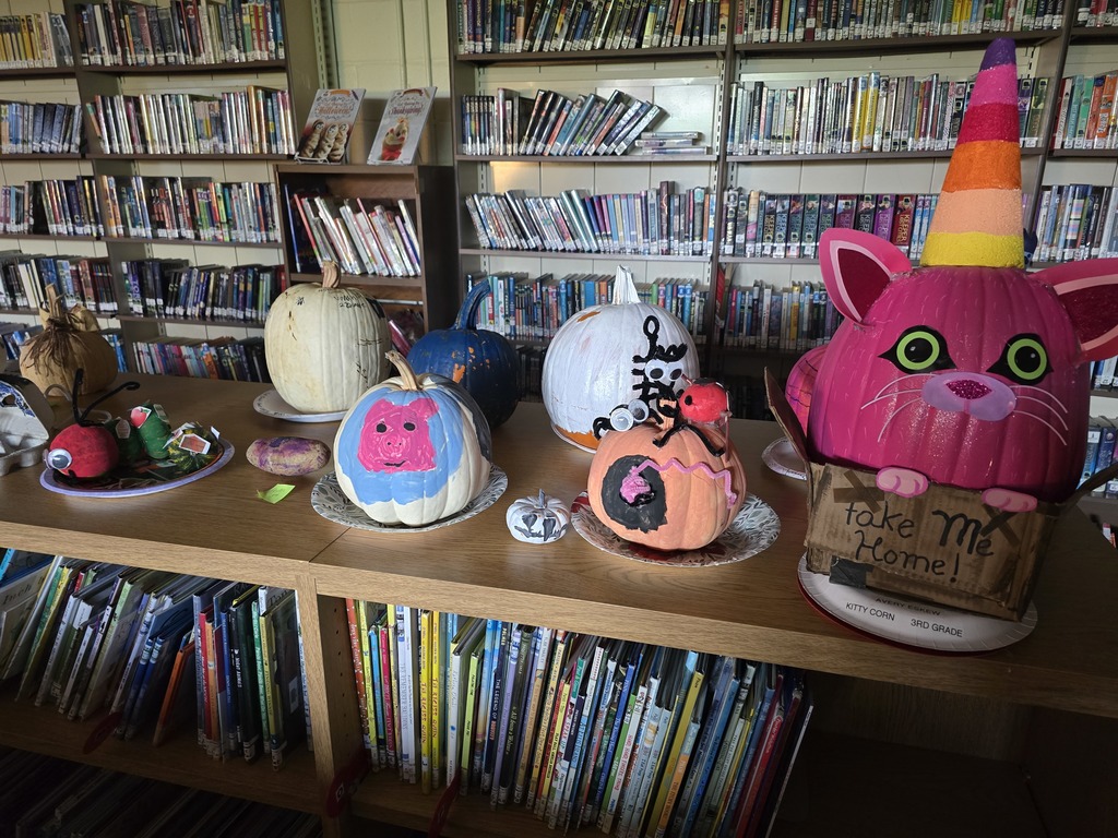 Storybook pumpkins and potatoes on display in the library