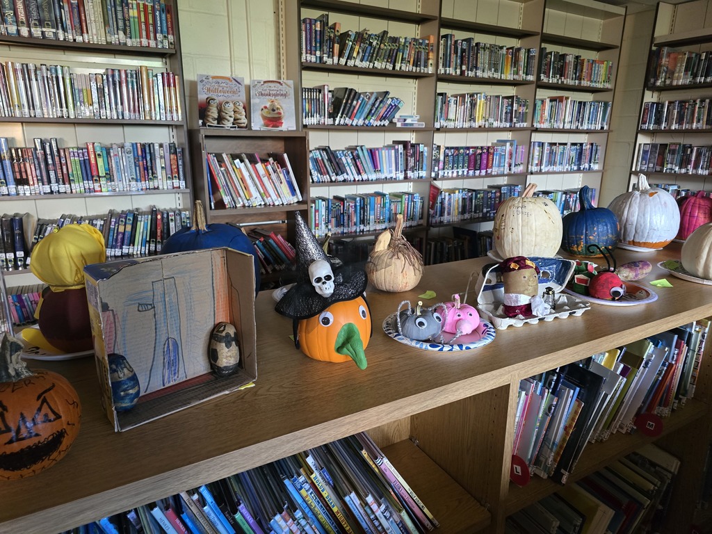 Storybook pumpkins and potatoes on display in the library