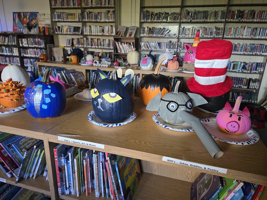 Storybook pumpkins and potatoes on display in the library