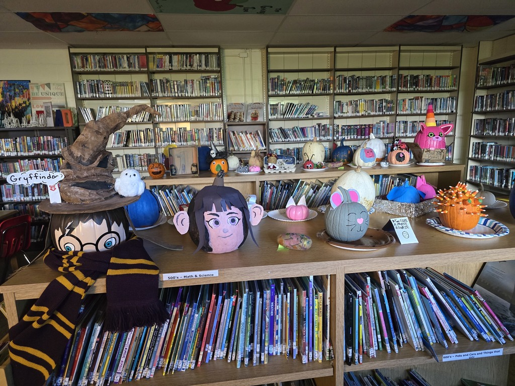 Storybook pumpkins and potatoes on display in the library