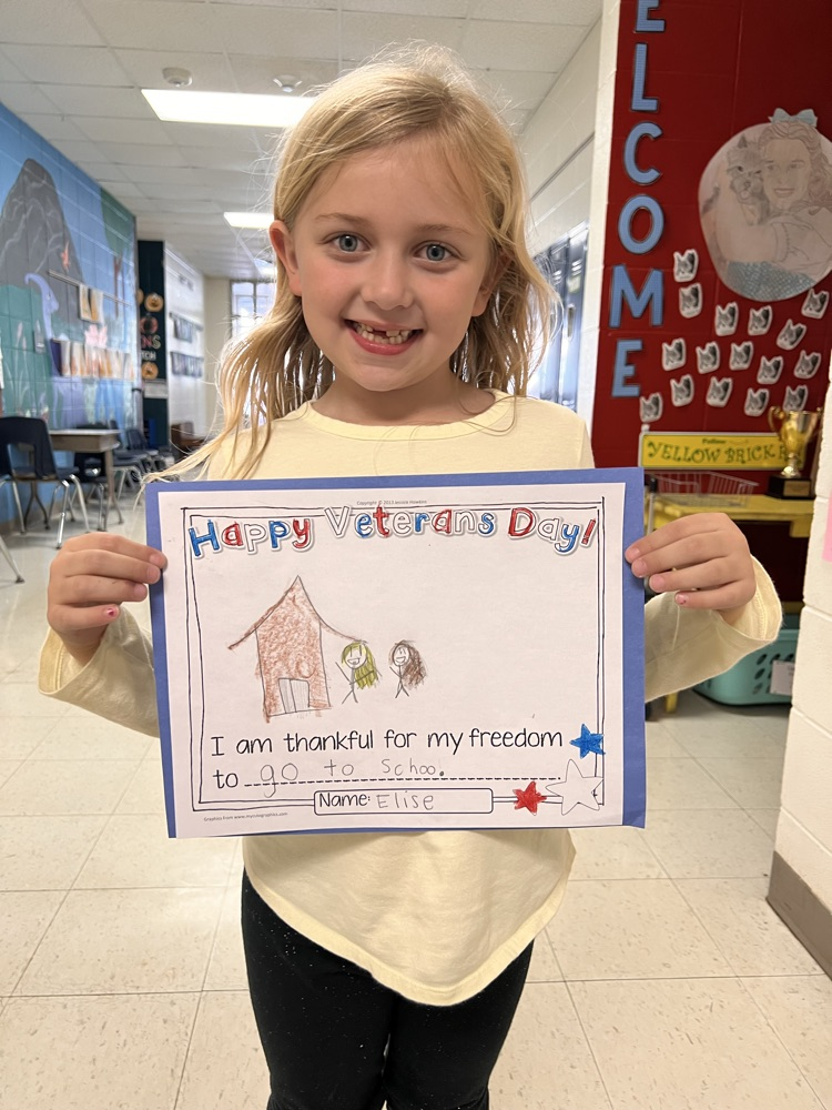 girl holding artwork