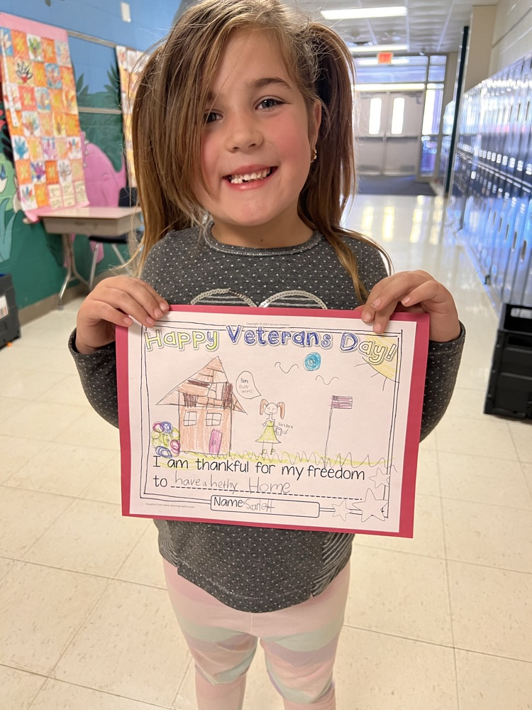 girl holding artwork