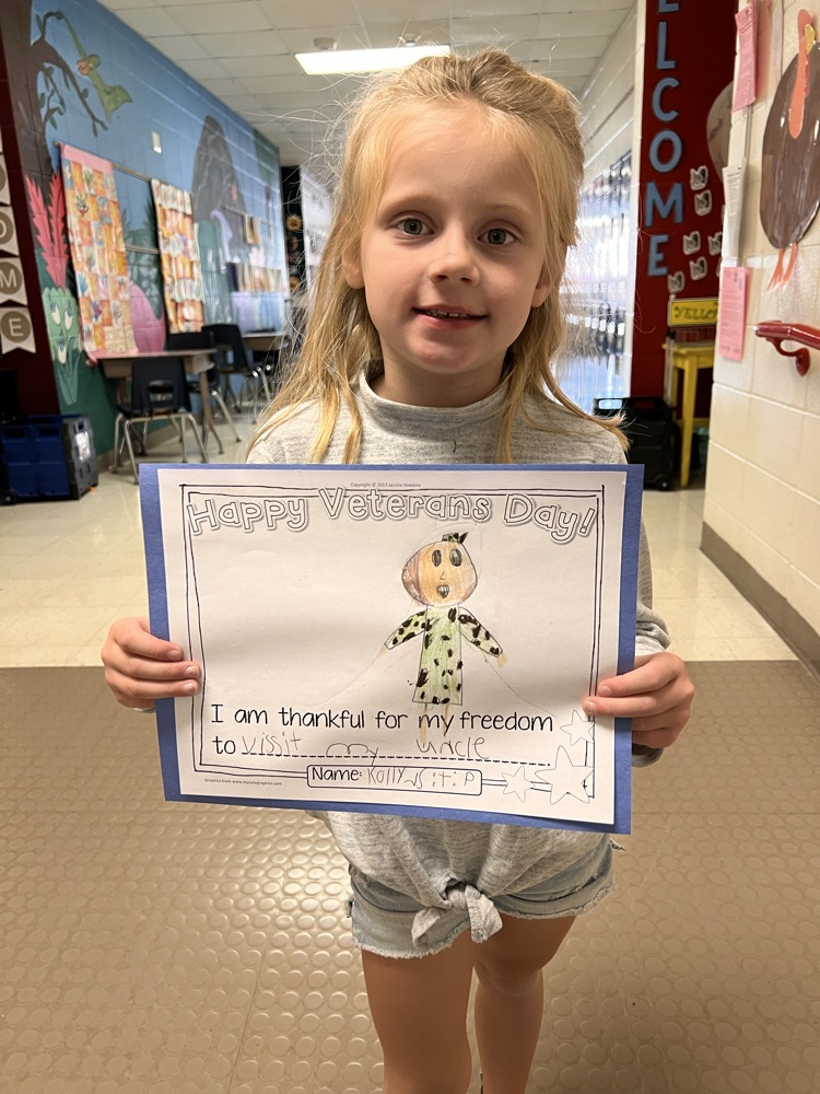girl holding artwork
